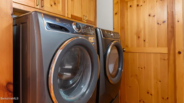 a utility room with dryer and washer