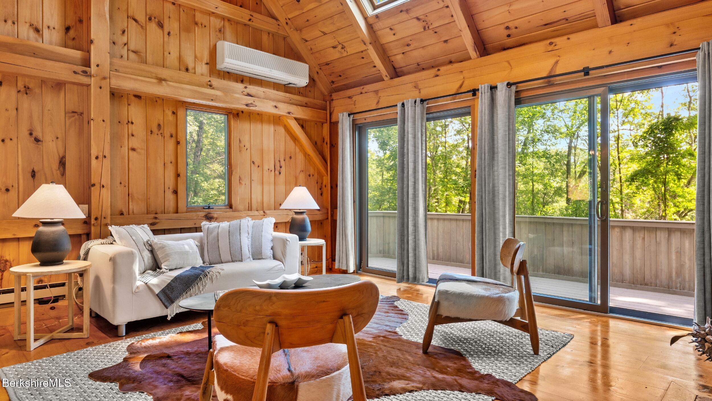 85 Main Road Monterey, MA 01230 - Photo 2 of 32 a living room with furniture and a large window