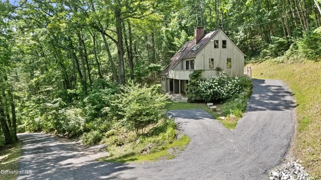 a view of a back yard of the house