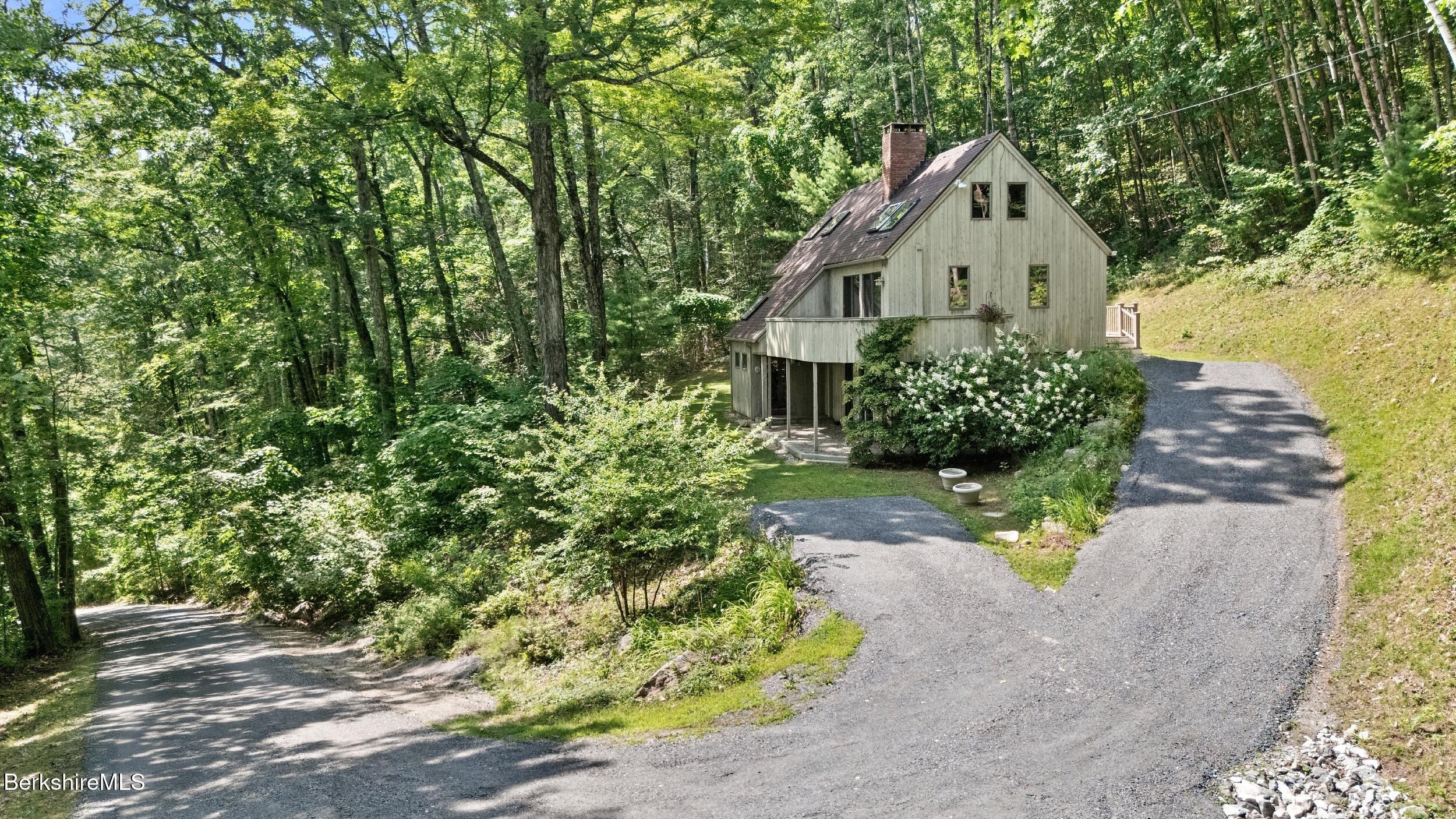 85 Main Road Monterey, MA 01230 - Photo 30 of 32 a view of a back yard of the house