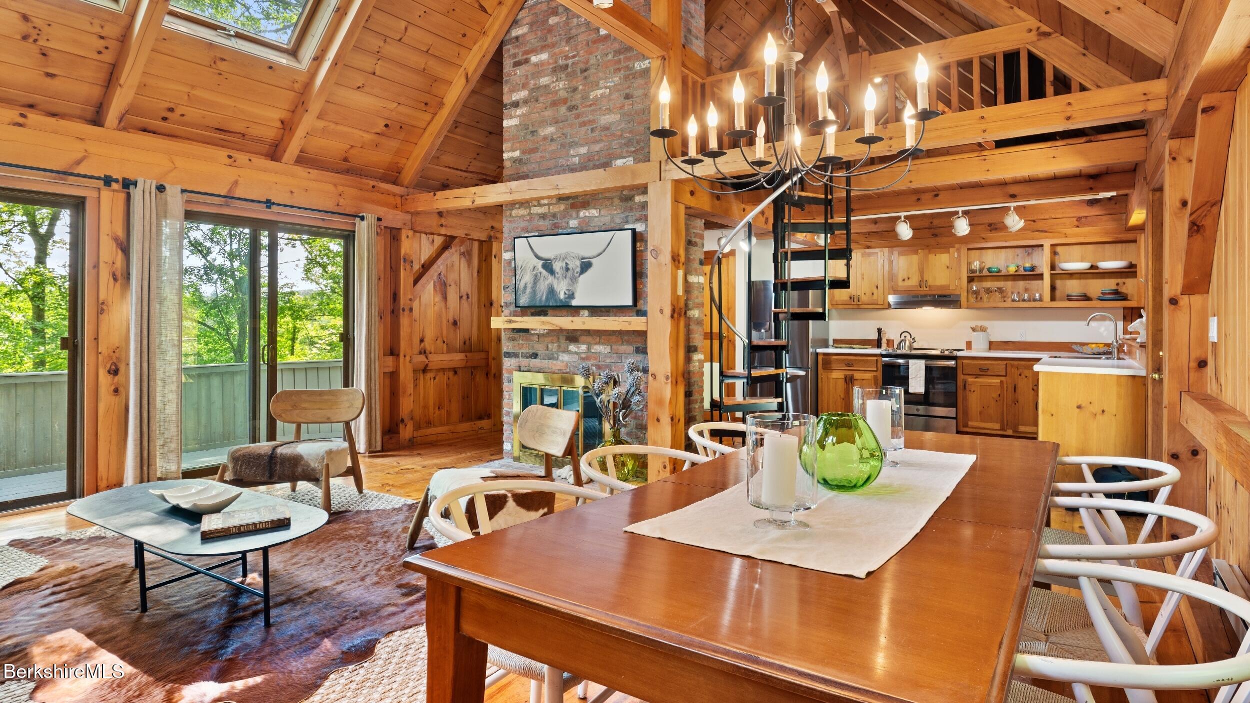 85 Main Road Monterey, MA 01230 - Photo 3 of 32 a view of a dining room with furniture window and outside view