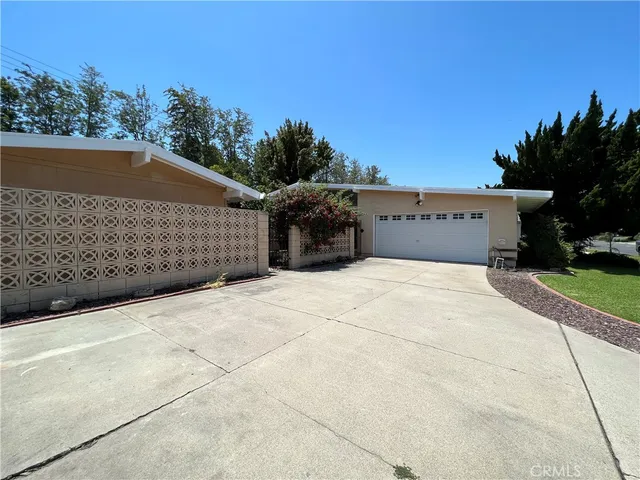 a house with trees in front of it