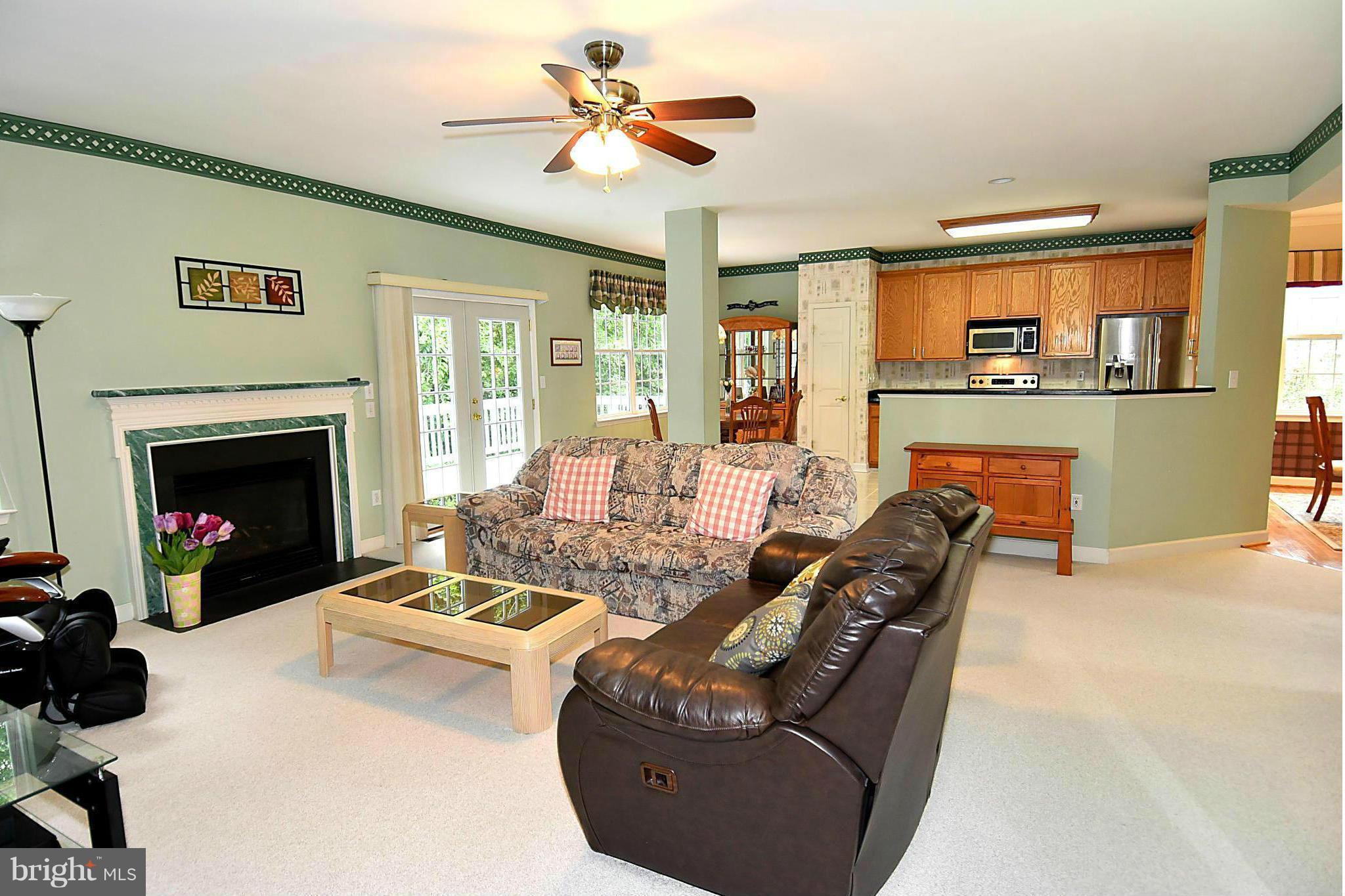18811 Severn Road Gaithersburg, MD 20879 - Photo 16 of 30 Family Room / Table Space Kitchen
