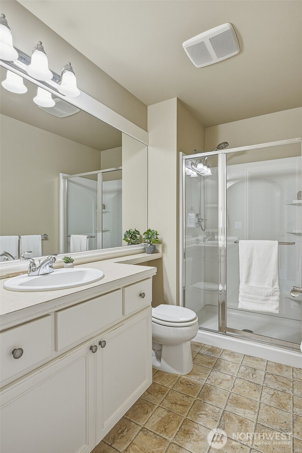 3932 221st Place Southeast Bothell, WA 98021 - Photo 30 of 36 a bathroom with a double vanity sink toilet and shower