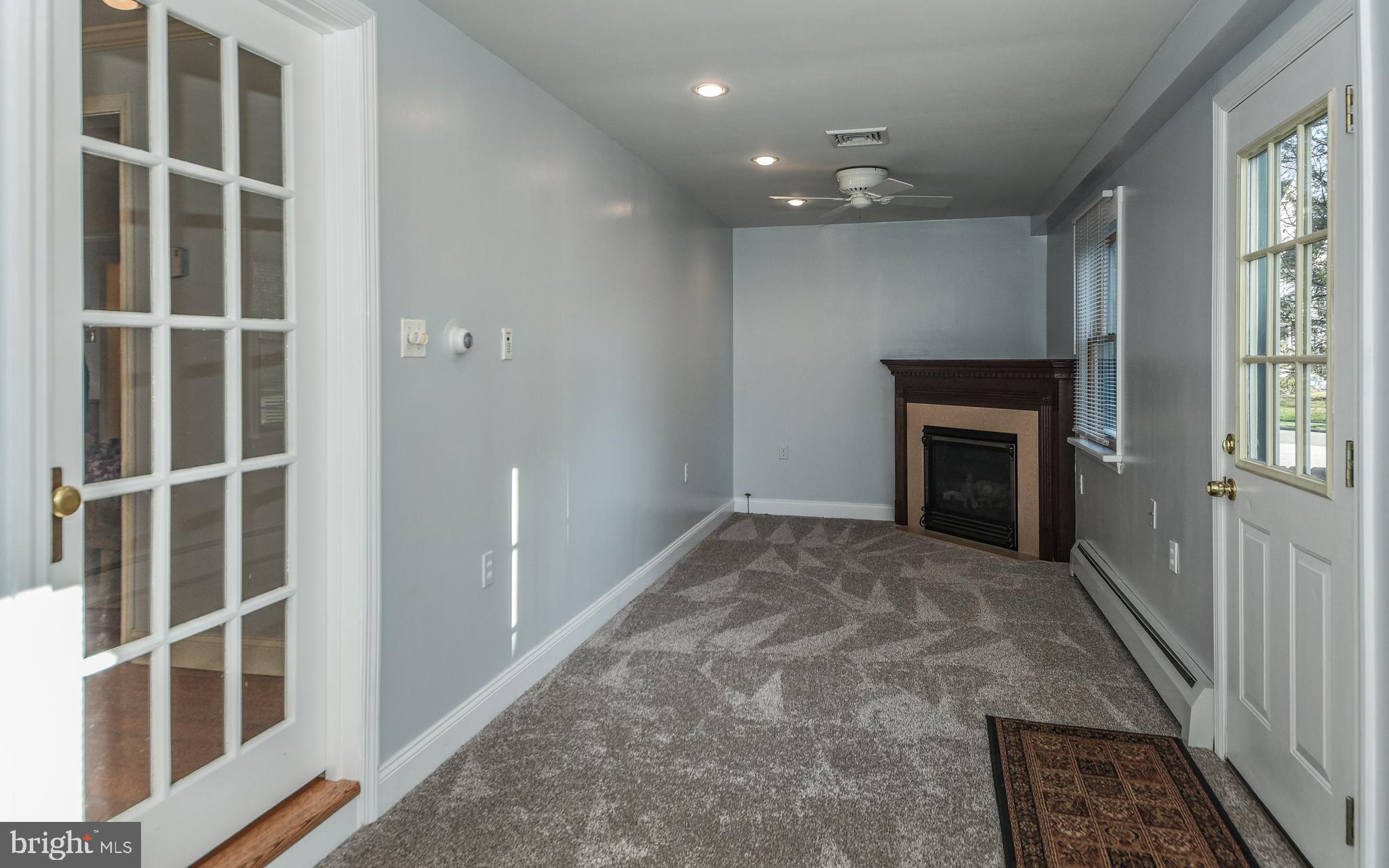 3 Erdenheim Road Glenside, PA 19038 - Photo 17 of 35 Family room with gas fireplace