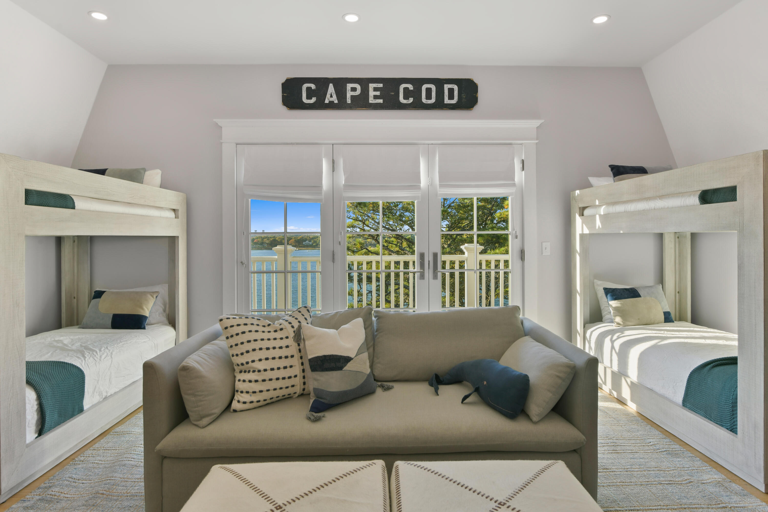 558 Fox Hill Road Chatham, MA 02633 - Photo 13 of 39 a living room with furniture and a large window