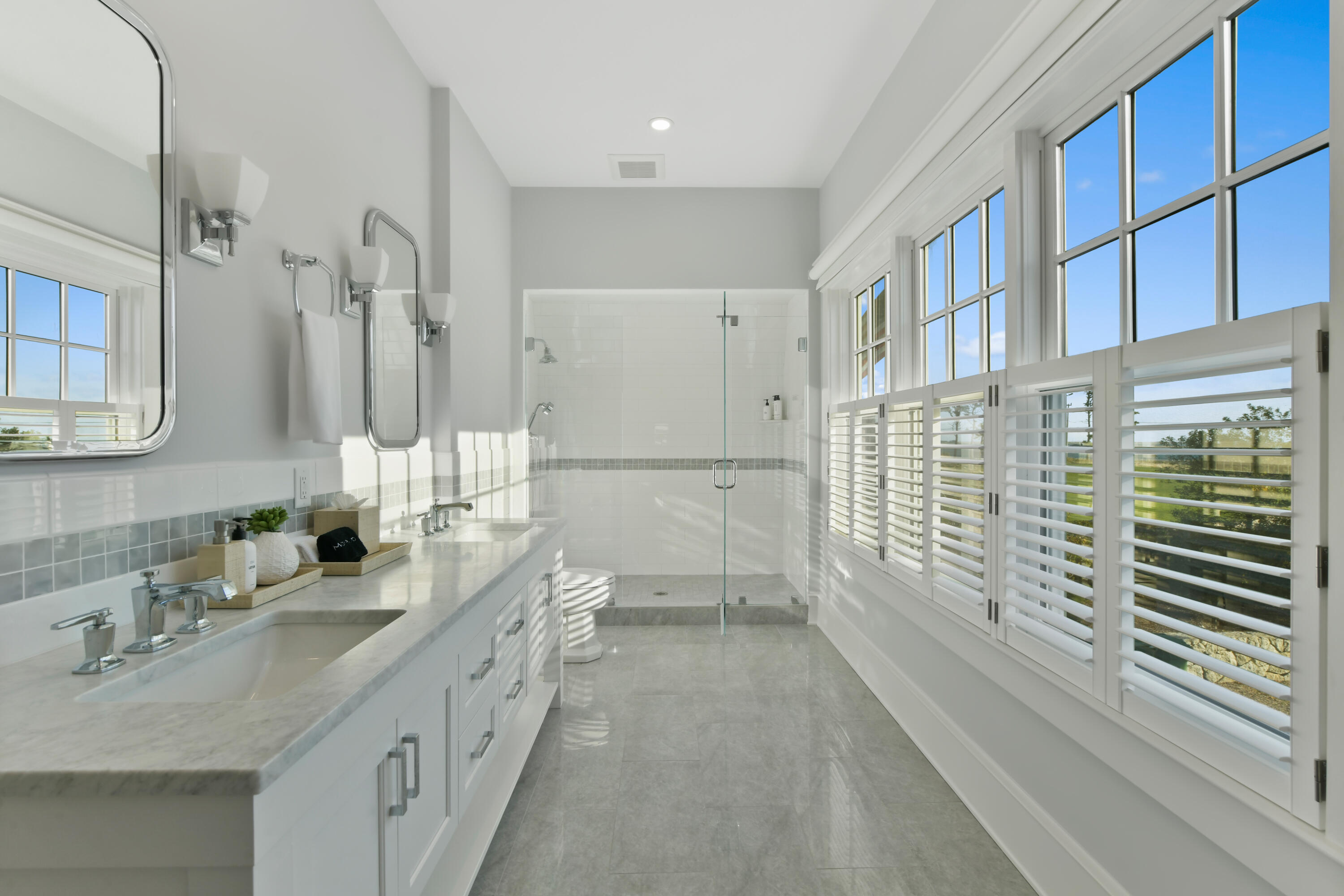 558 Fox Hill Road Chatham, MA 02633 - Photo 15 of 39 a bathroom with a double vanity sink a toilet and shower