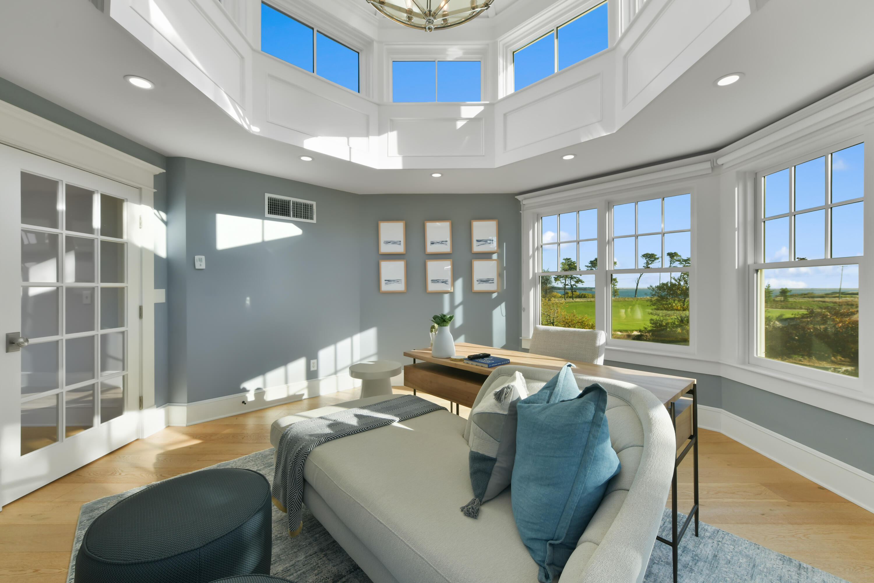 558 Fox Hill Road Chatham, MA 02633 - Photo 18 of 39 a living room with furniture and a floor to ceiling window
