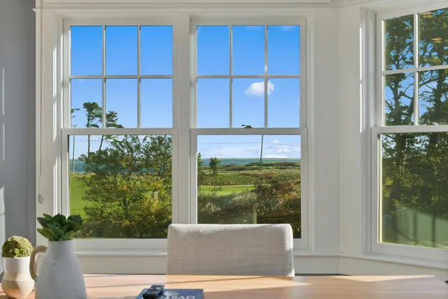 a view of a living room and a window