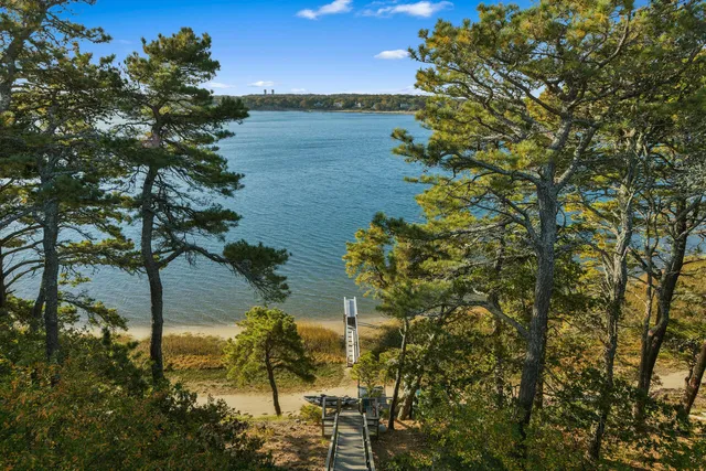 a backyard of a house with a lake view