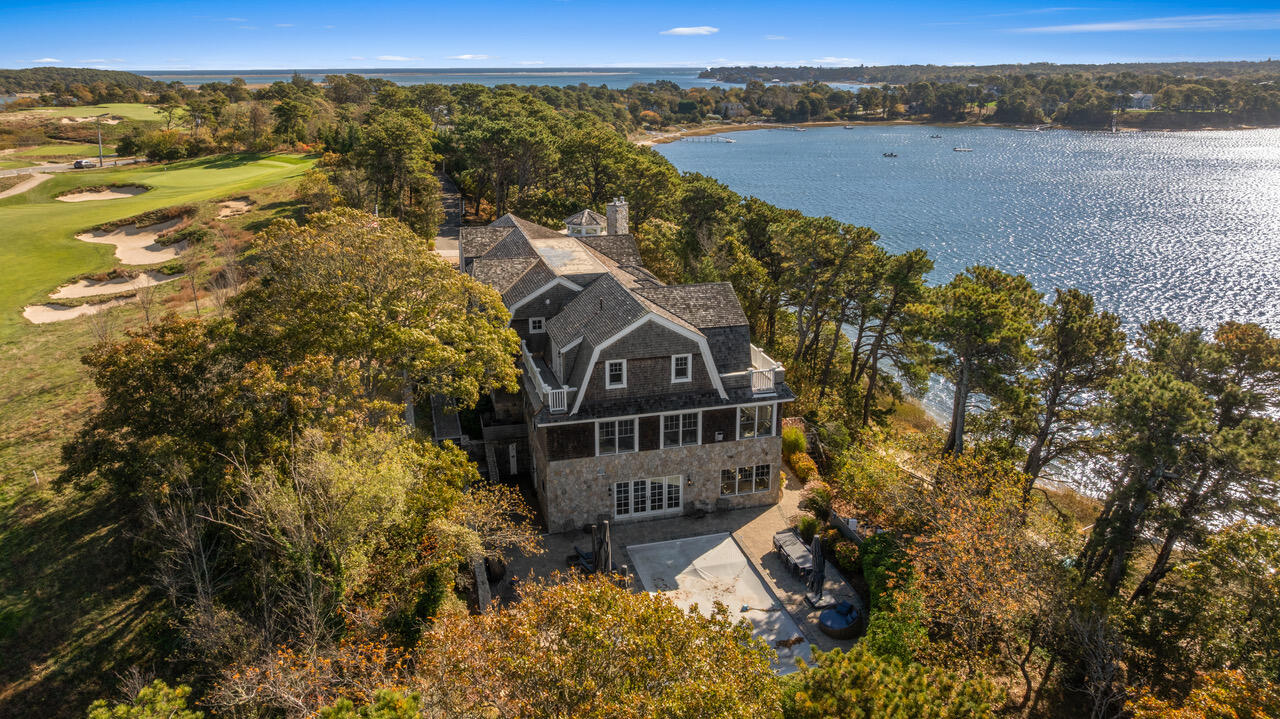 558 Fox Hill Road Chatham, MA 02633 - Photo 25 of 39 a view of a lake with a mountain