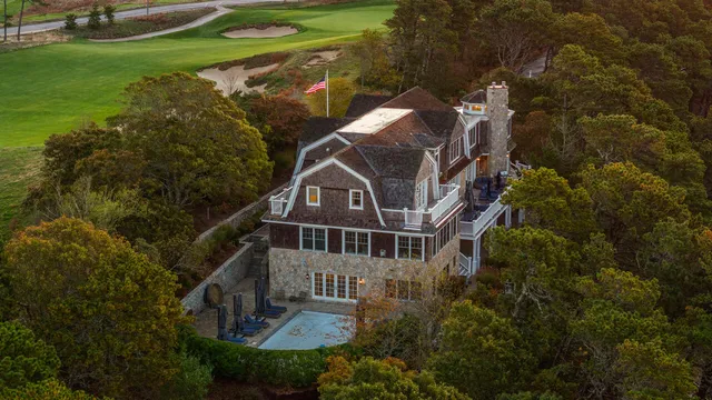 an aerial view of a house with a garden