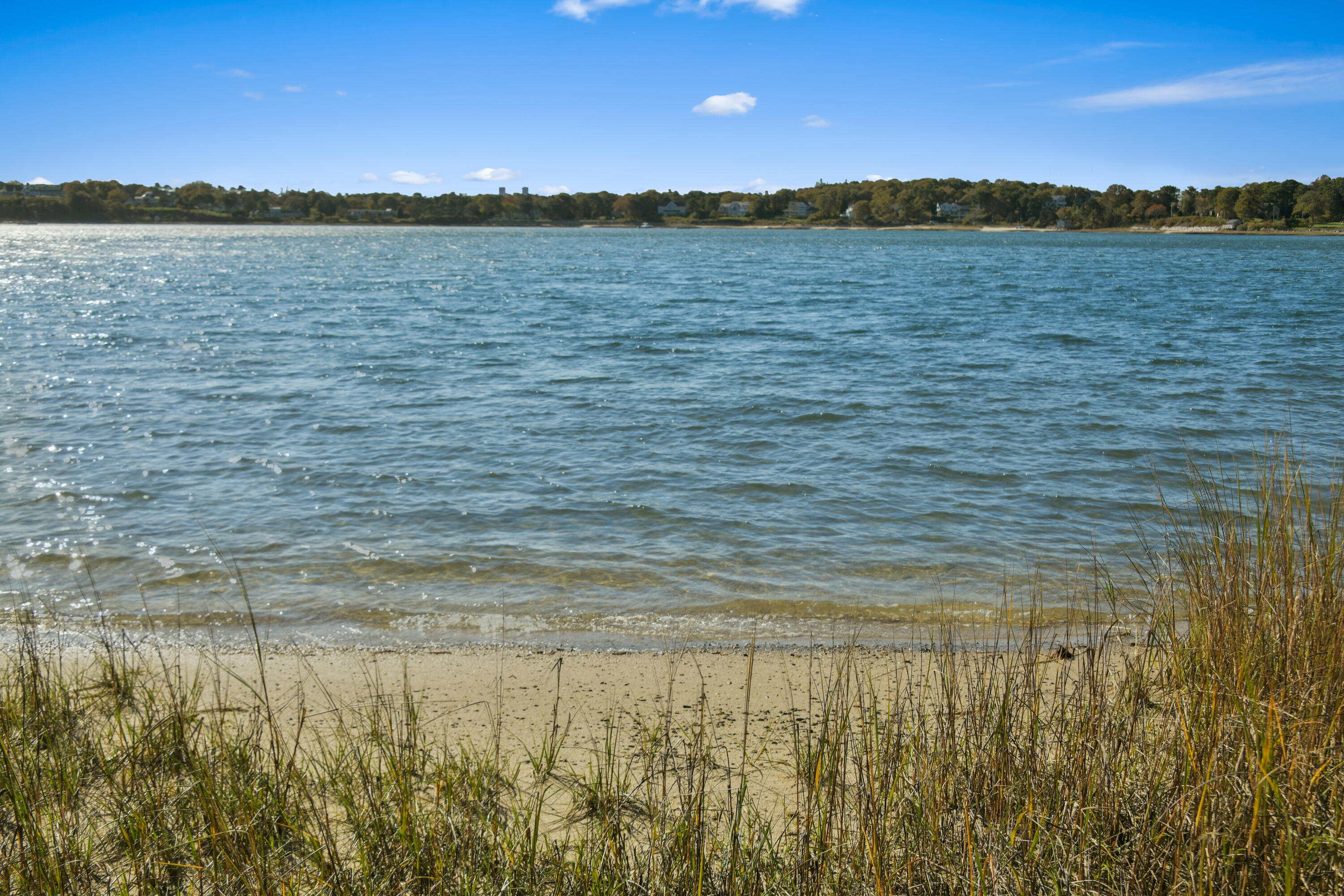 558 Fox Hill Road Chatham, MA 02633 - Photo 4 of 39 a view of lake with sunset in background