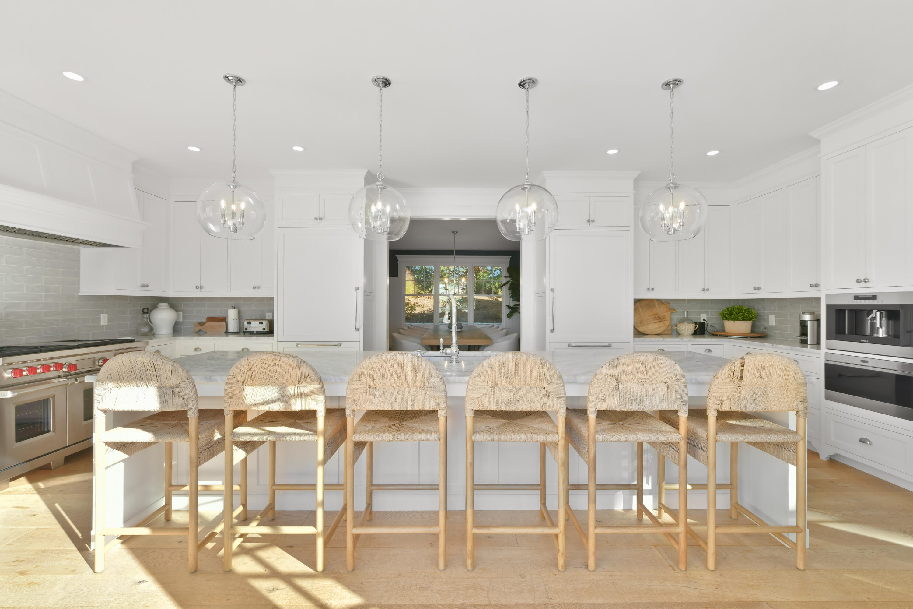 558 Fox Hill Road Chatham, MA 02633 - Photo 6 of 39 a large kitchen with a table and chairs