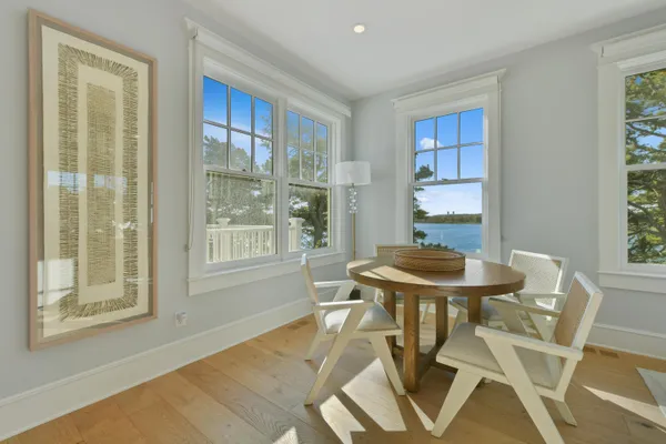 a view of a dining room with furniture window and outside view