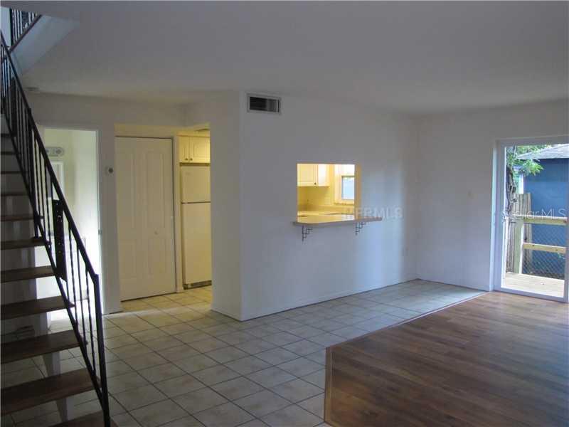 1121 Sunset Point Road Clearwater, FL 33755 - Photo 3 of 21 Living Room - unit #1119