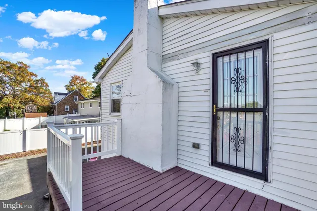 a view of a porch with wooden floor