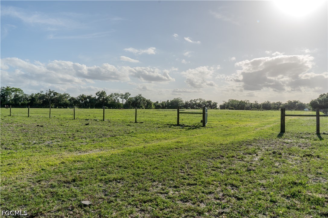 515 Norris Road Fort Denaud, FL 33935 - Photo 13 of 13 a view of a golf course with a lake