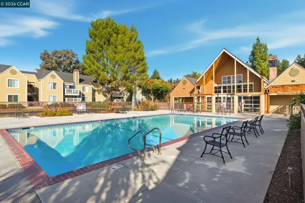 a view of a house with a swimming pool