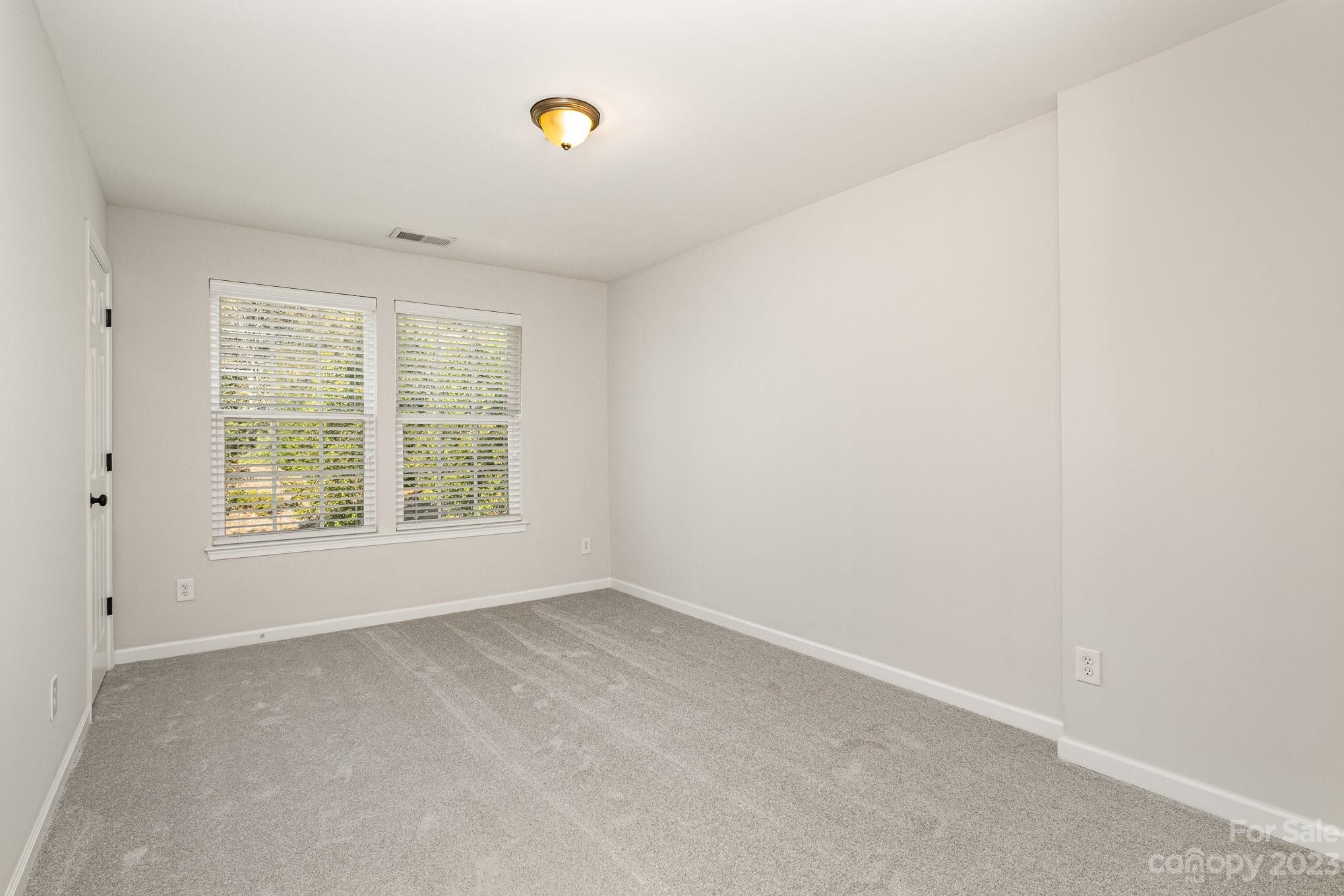 717 Prospect Lane Fort Mill, SC 29708 - Photo 17 of 21 an empty room with a window