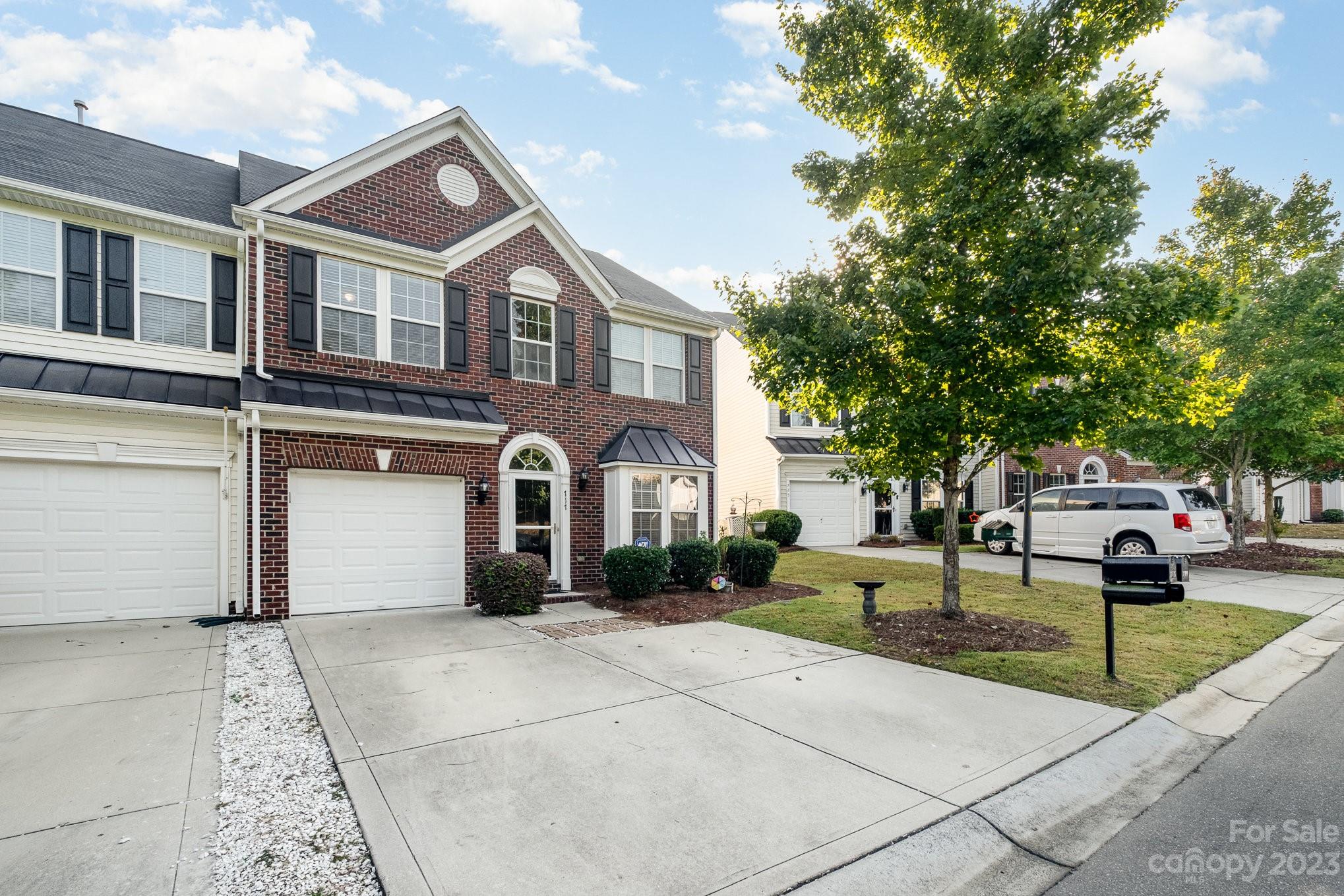 717 Prospect Lane Fort Mill, SC 29708 - Photo 20 of 21 a front view of a house with garden