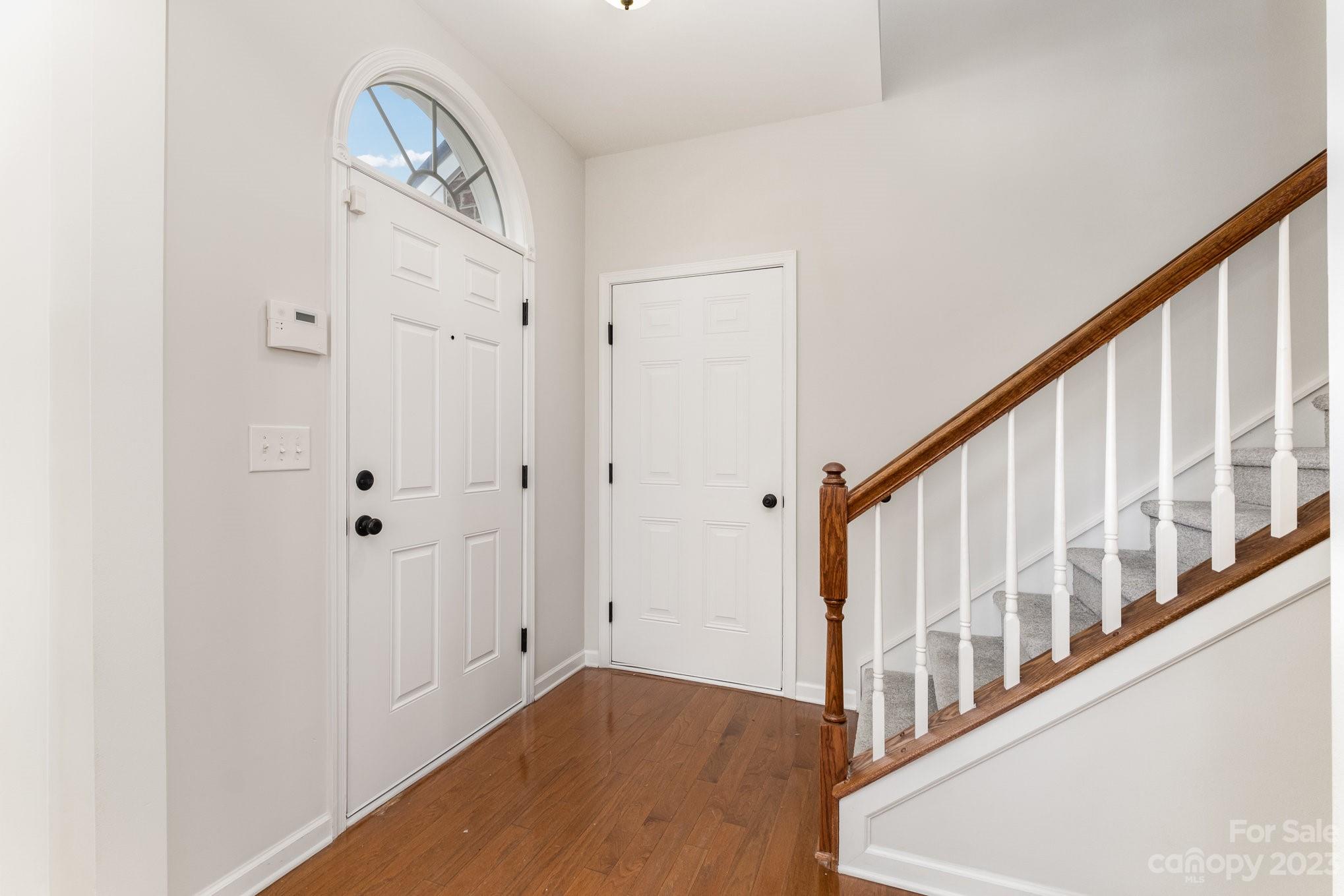 717 Prospect Lane Fort Mill, SC 29708 - Photo 2 of 21 a view of an entryway with wooden floor