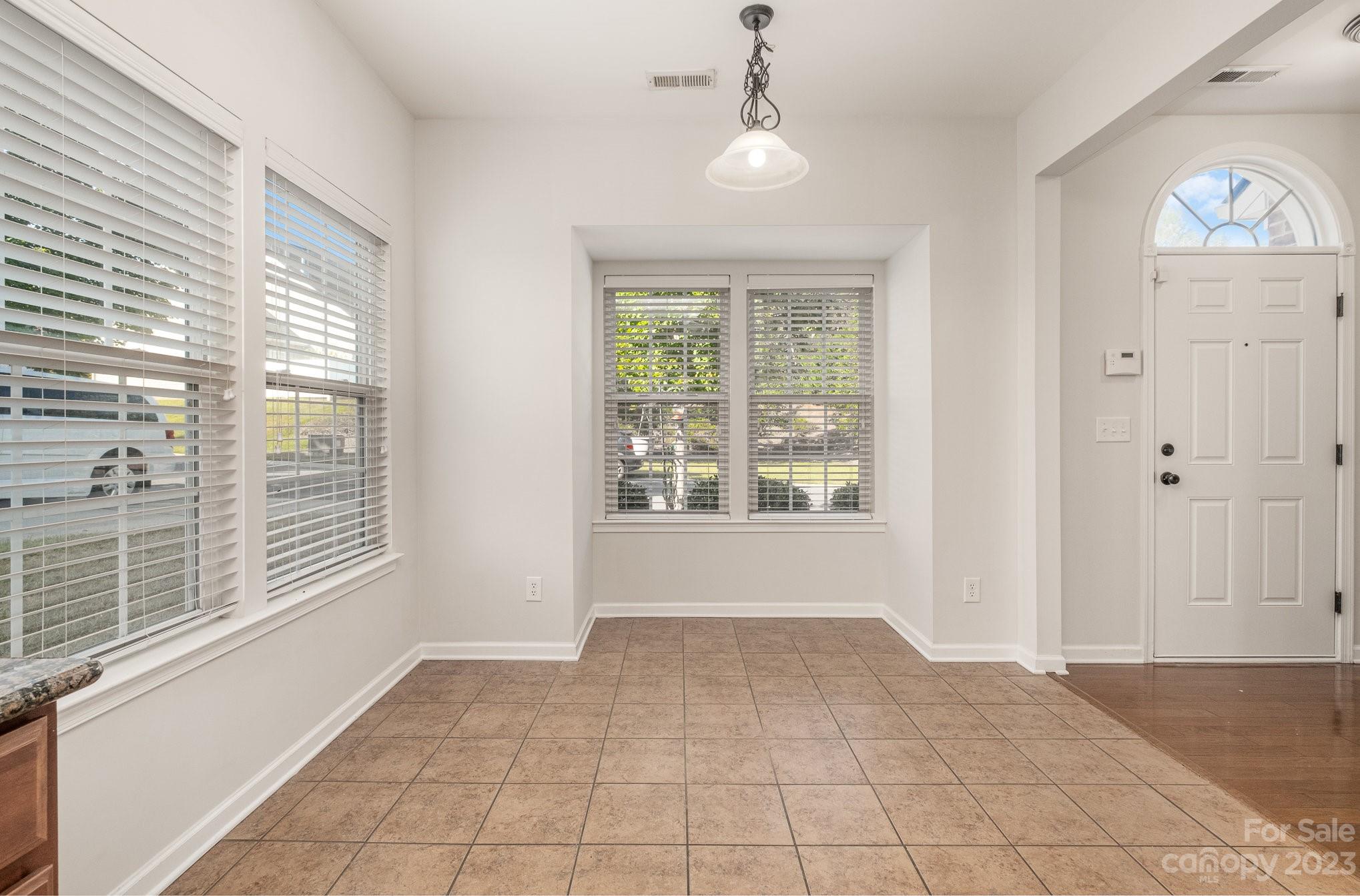 717 Prospect Lane Fort Mill, SC 29708 - Photo 7 of 21 a view of an empty room with a window