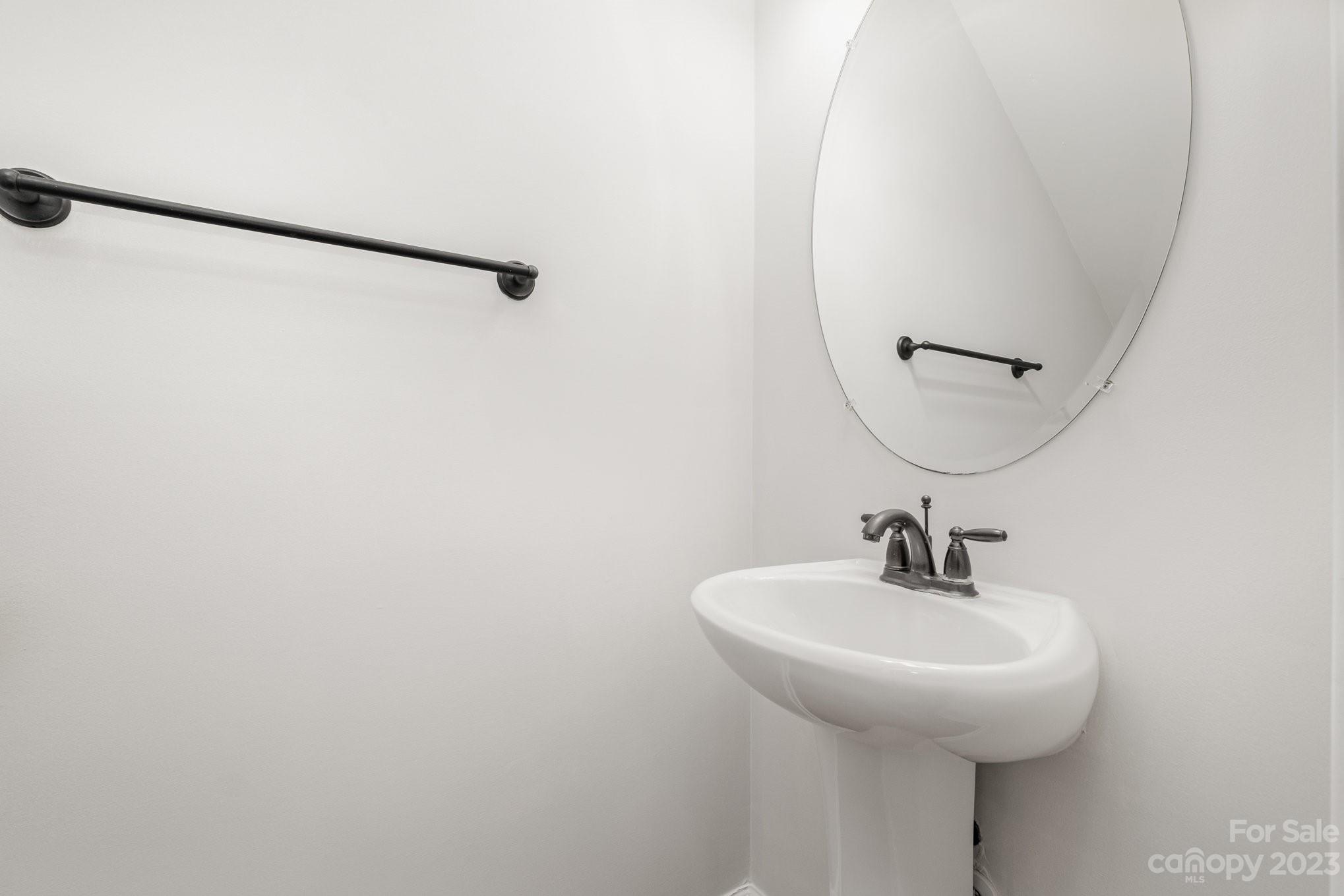 717 Prospect Lane Fort Mill, SC 29708 - Photo 9 of 21 a bathroom with a sink and mirror