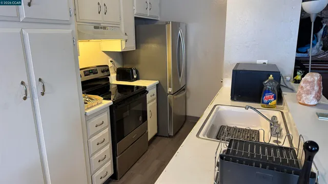 a bedroom with a bed and the closet