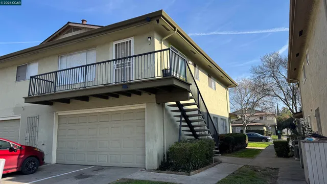 a view of a house with a street