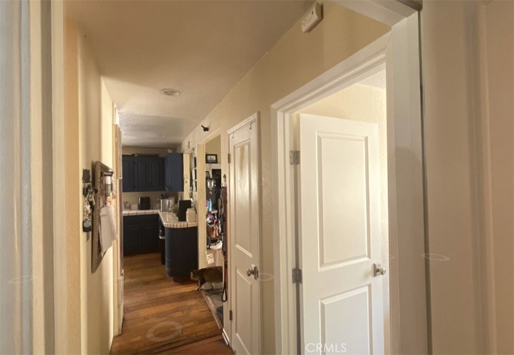 4115 East 6th Street Long Beach, CA 90814 - Photo 9 of 34 a view of a hallway with living room and dining room