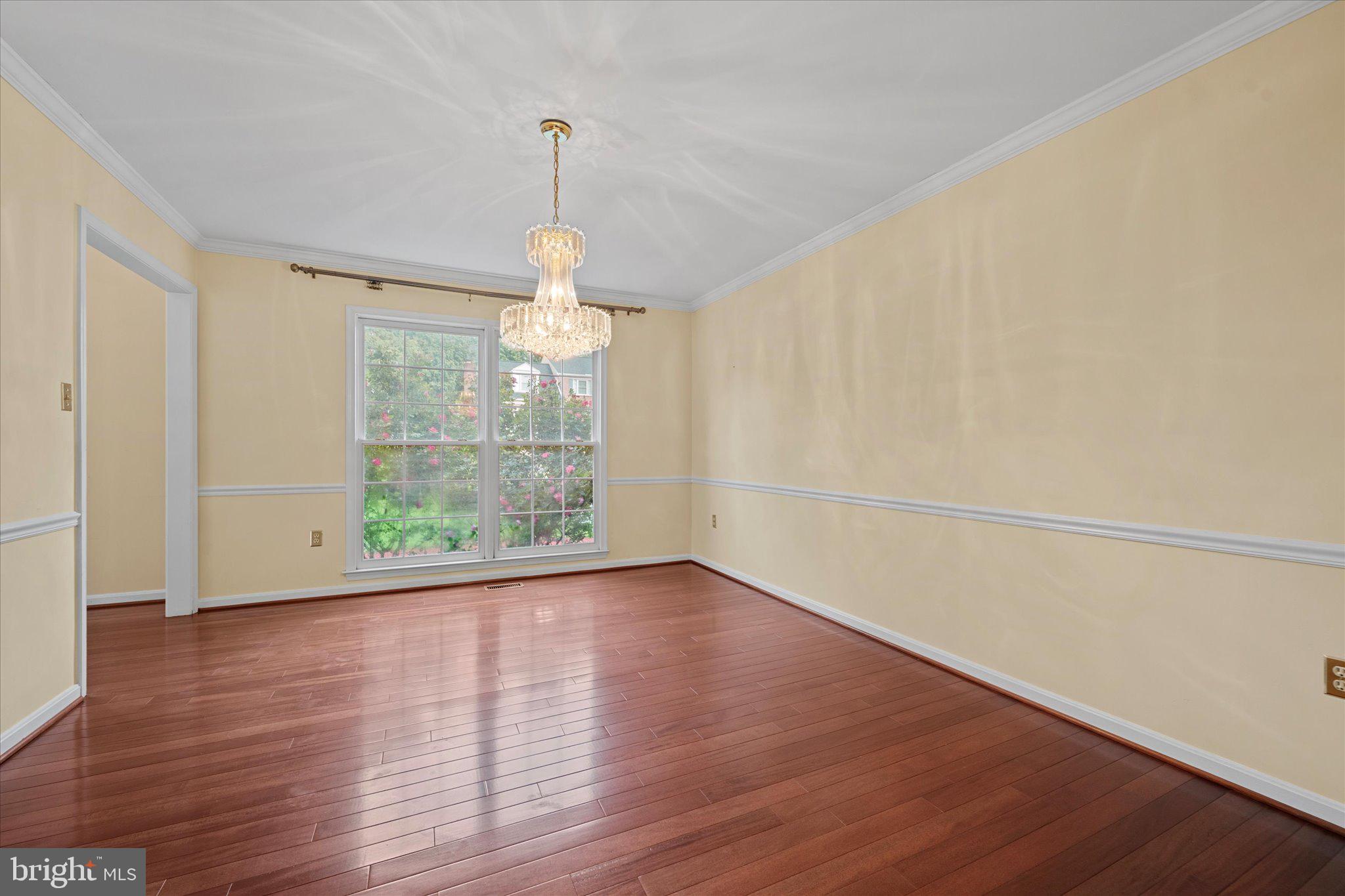 6832 Compton Heights Circle Clifton, VA 20124 - Photo 20 of 54 a view of empty room with wooden floor and fan