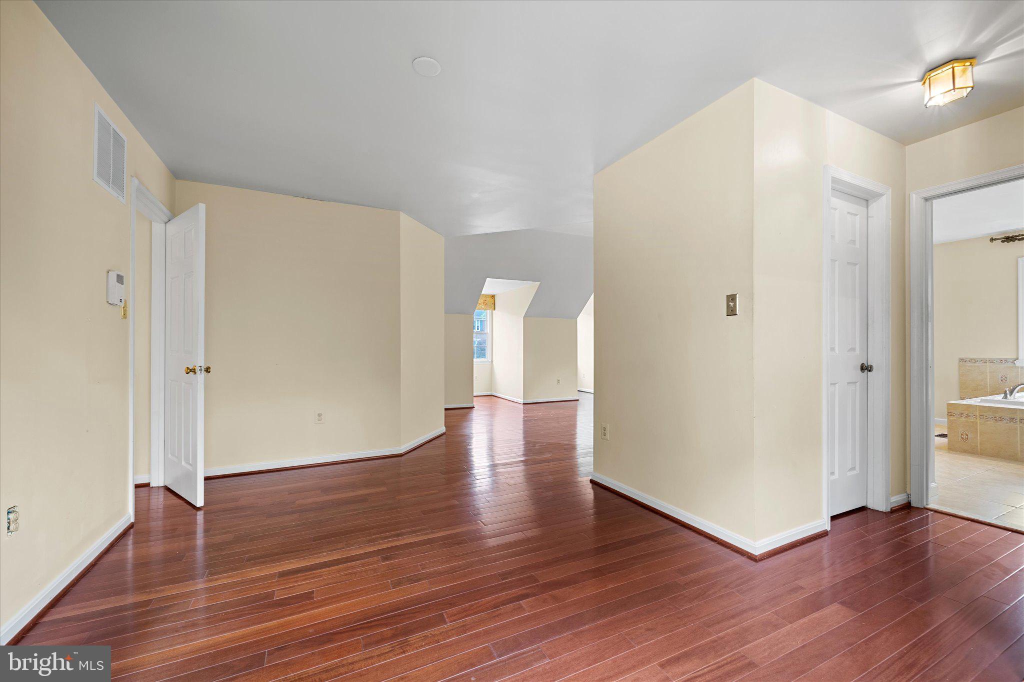 6832 Compton Heights Circle Clifton, VA 20124 - Photo 26 of 54 a view of empty room with wooden floor
