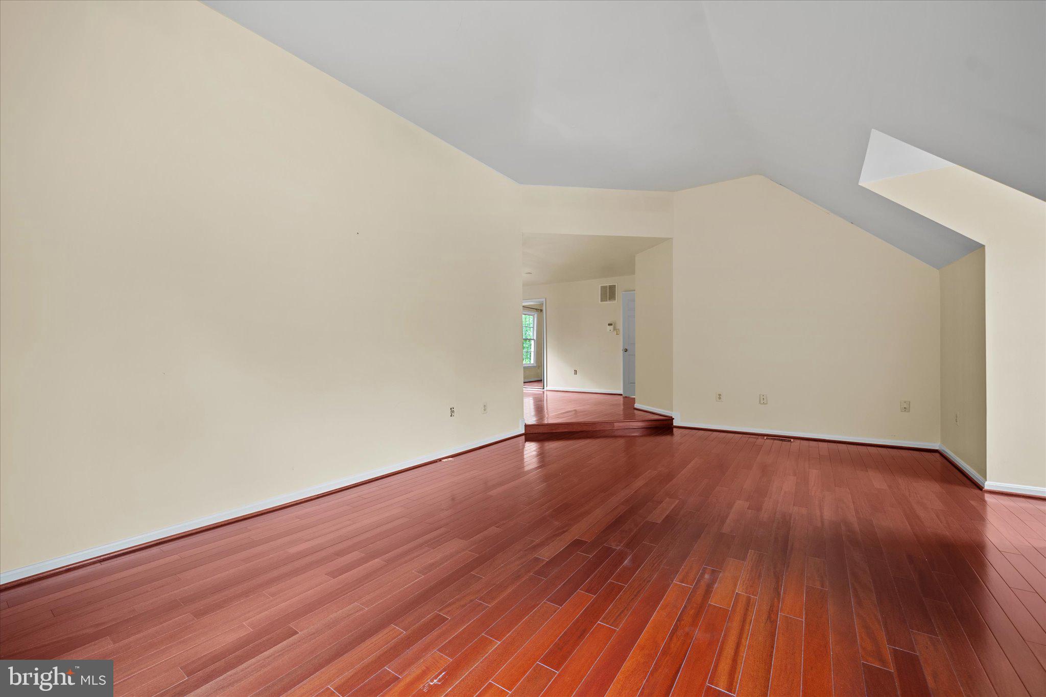 6832 Compton Heights Circle Clifton, VA 20124 - Photo 28 of 54 an empty room with wooden floor