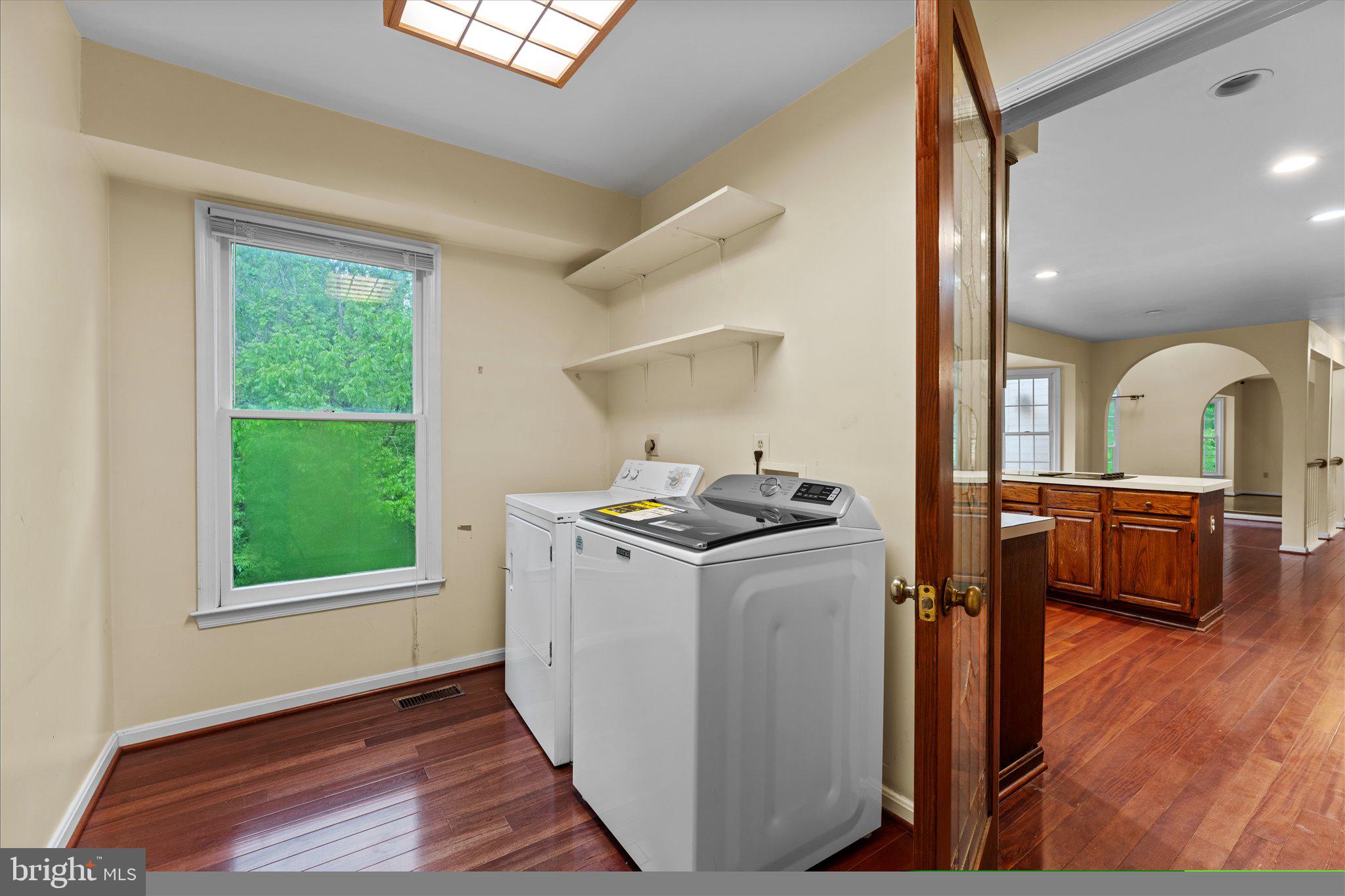 6832 Compton Heights Circle Clifton, VA 20124 - Photo 40 of 54 a view of a kitchen with a sink and a window