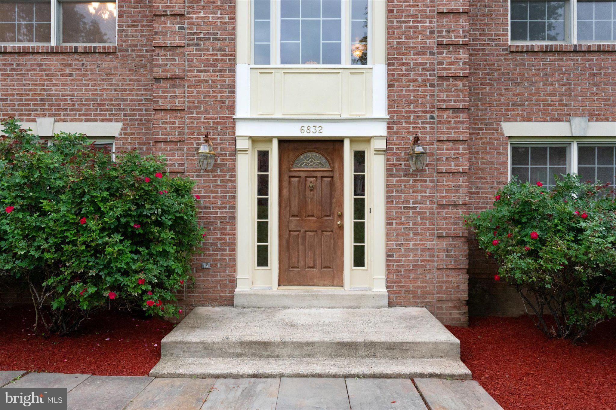 6832 Compton Heights Circle Clifton, VA 20124 - Photo 4 of 54 a front view of a house with plants