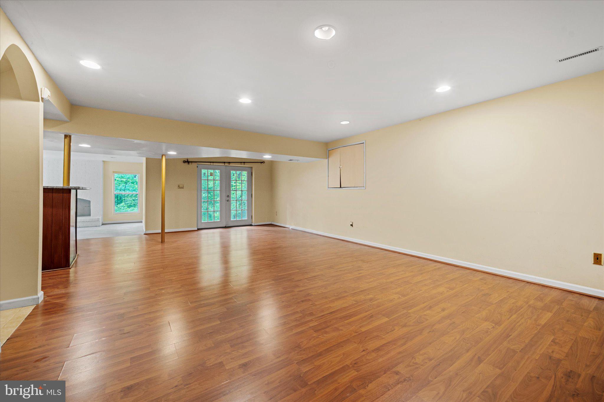 6832 Compton Heights Circle Clifton, VA 20124 - Photo 43 of 54 a view of an empty room with wooden floor