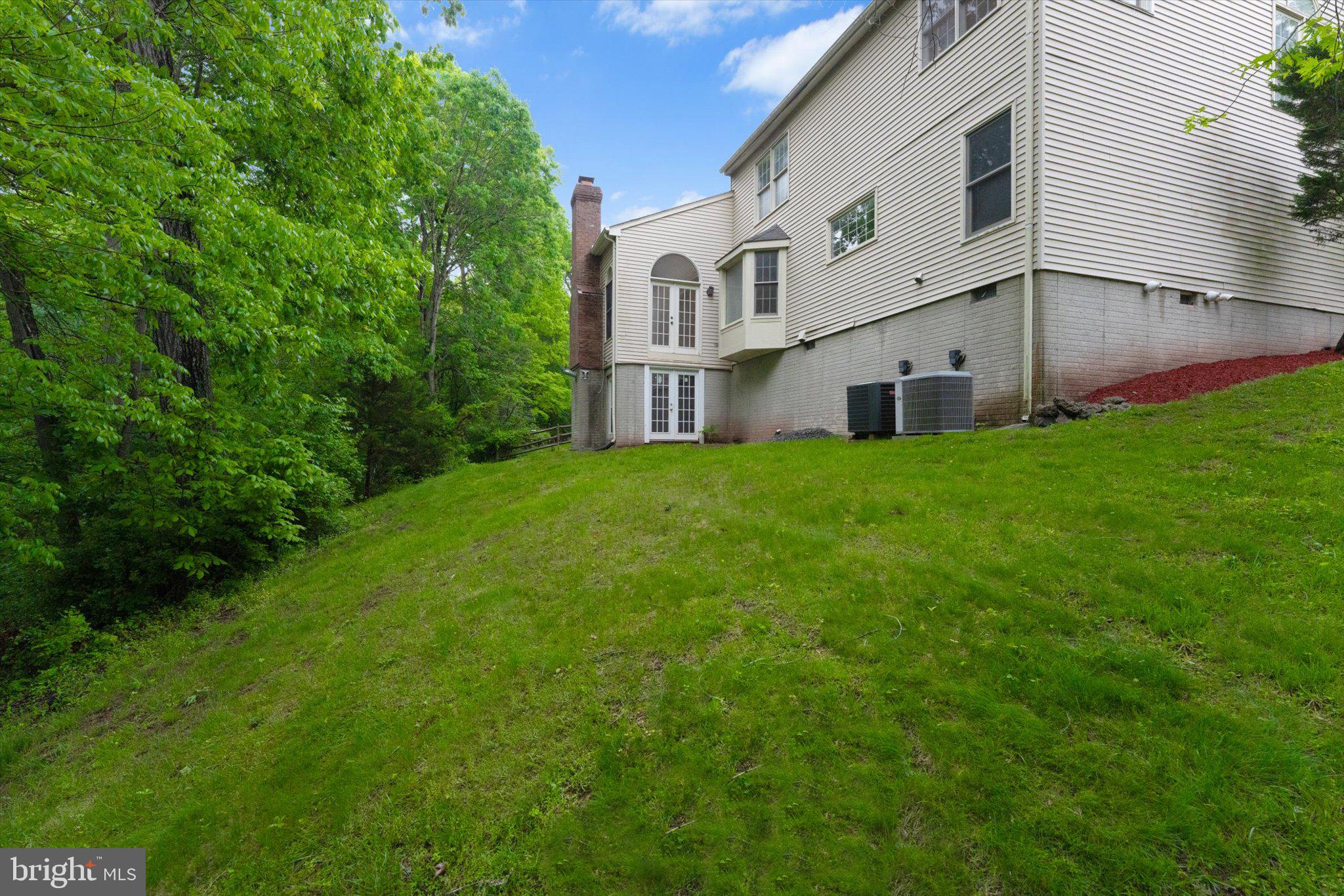 6832 Compton Heights Circle Clifton, VA 20124 - Photo 52 of 54 a view of backyard with garden