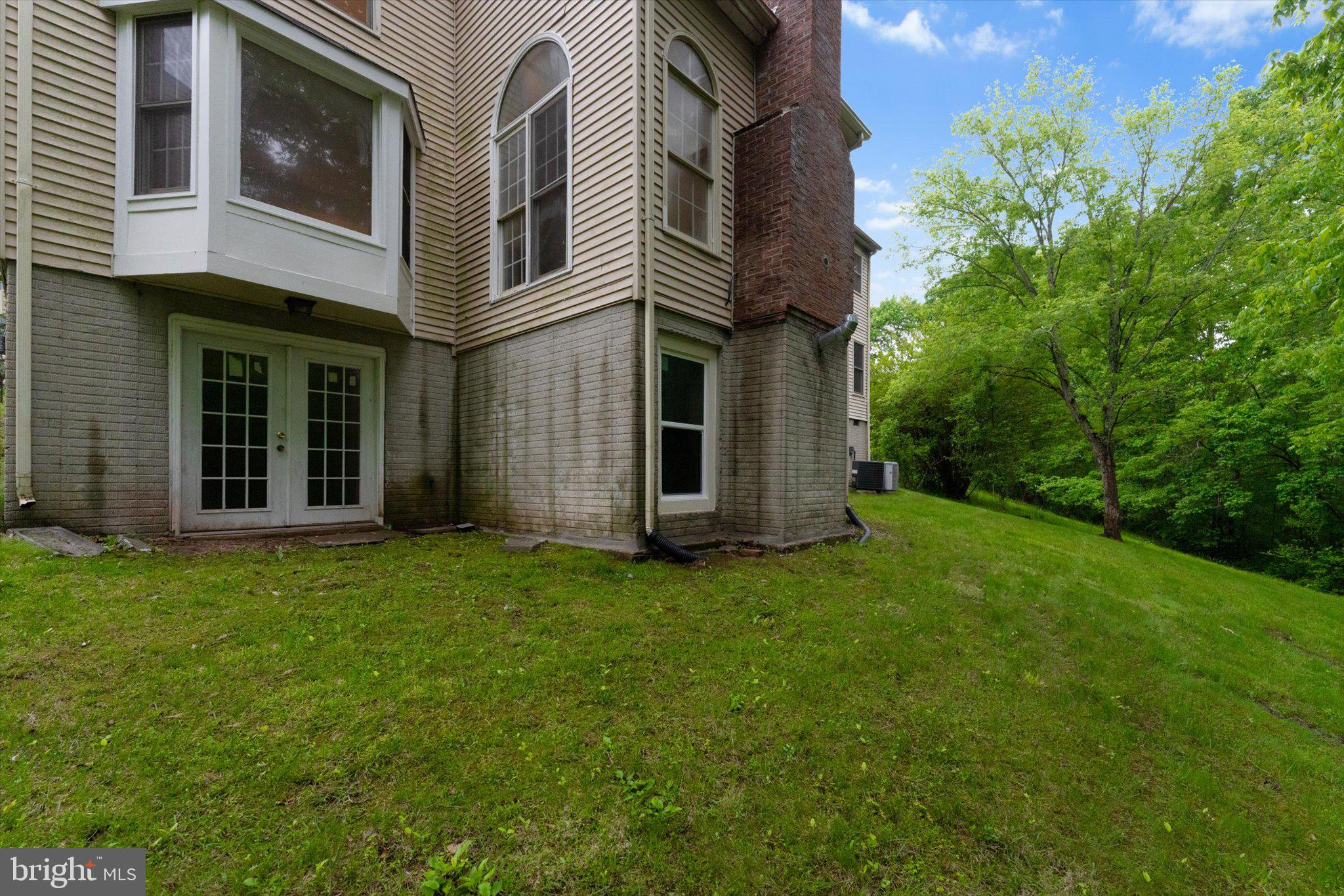 6832 Compton Heights Circle Clifton, VA 20124 - Photo 53 of 54 front view of a house with a yard
