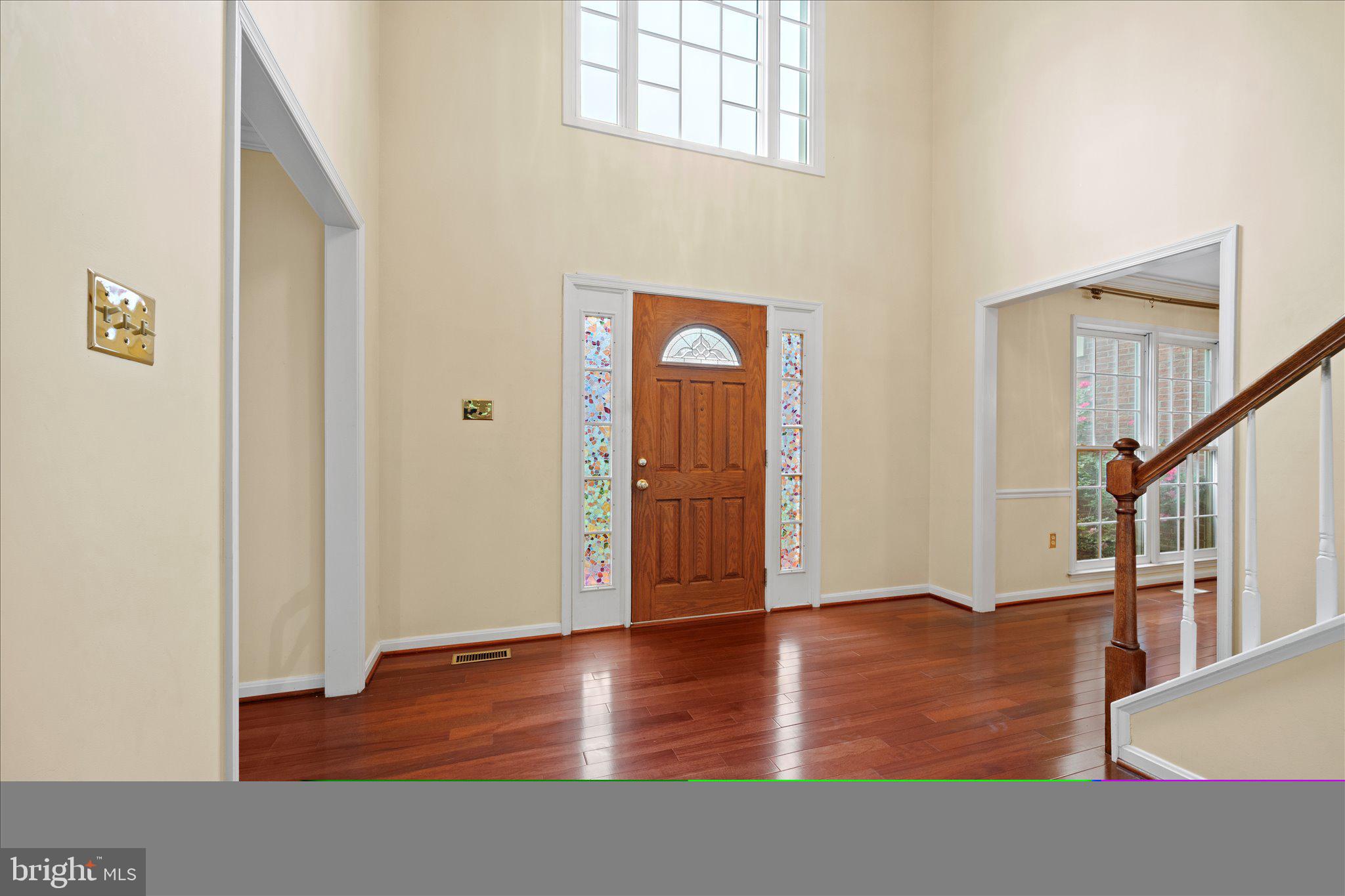 6832 Compton Heights Circle Clifton, VA 20124 - Photo 6 of 54 a view of an entryway with wooden floor