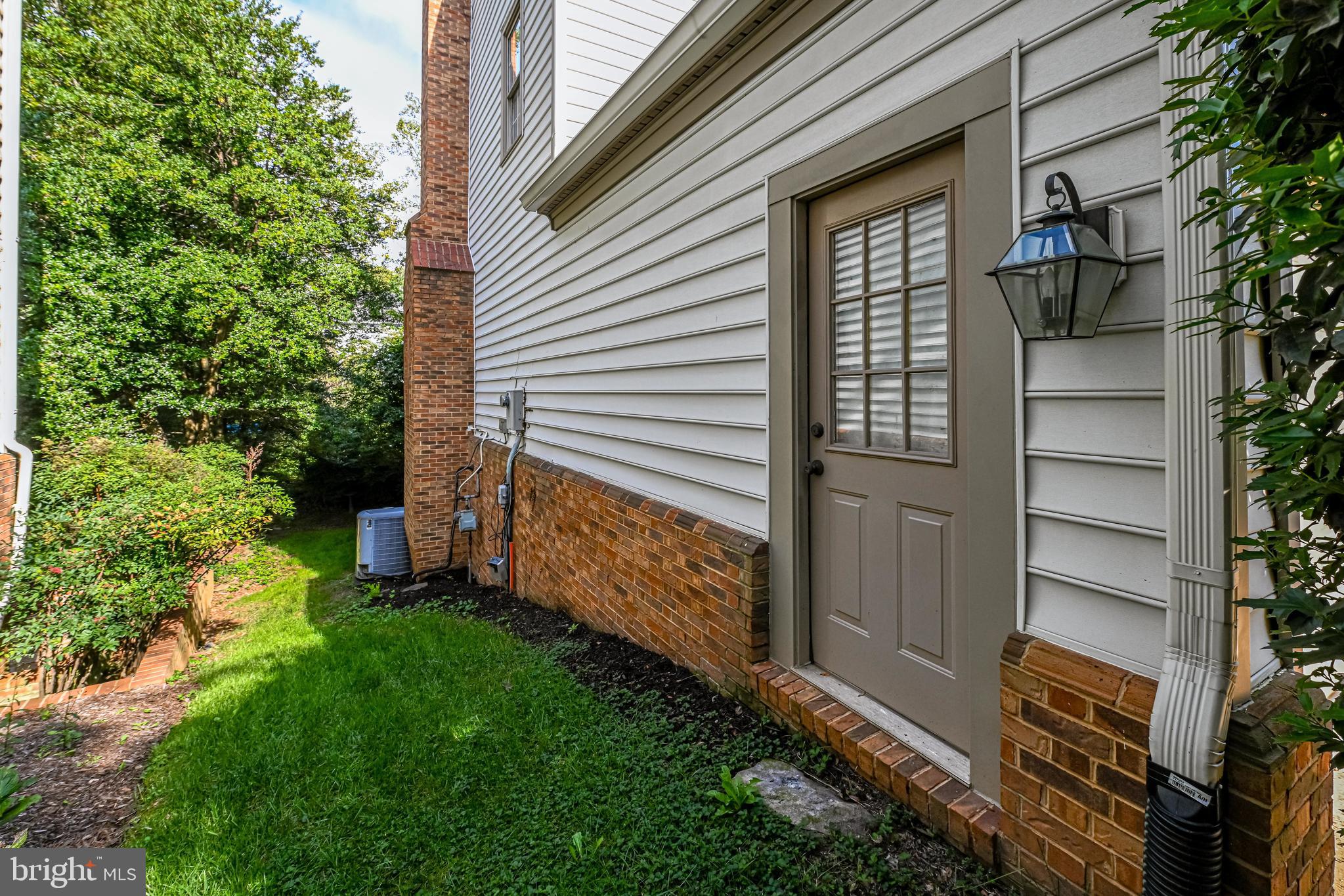 9728 Hidden Valley Road Vienna, VA 22181 - Photo 49 of 56 Door from the garage to the outside yard