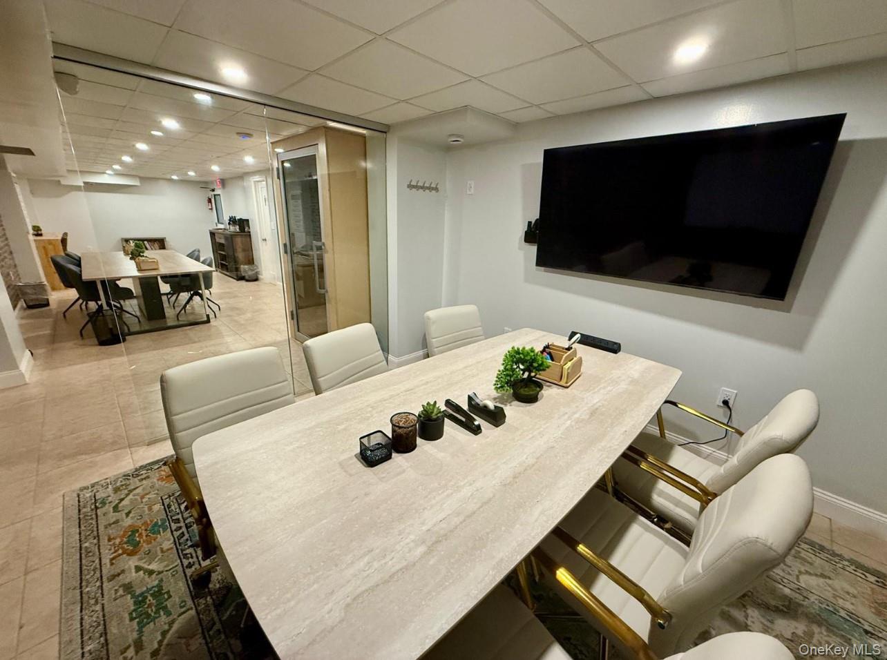 230 Pelham Road, Unit 2E New Rochelle, NY 10805 - Photo 22 of 31 Dining area featuring a paneled ceiling, light tile patterned floors, and recessed lighting