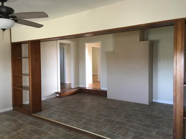 an empty room with windows