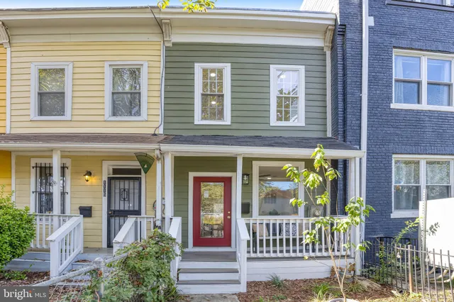 a view of a brick building with a large windows