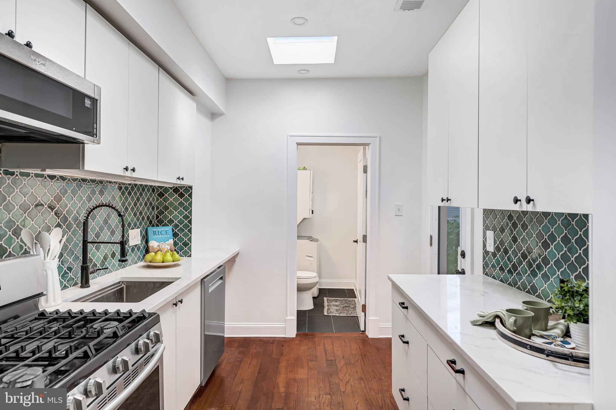 1113 Holbrook Terrace Northeast Washington, DC 20002 - Photo 3 of 28 Well-designed kitchen with ample cabinetry.