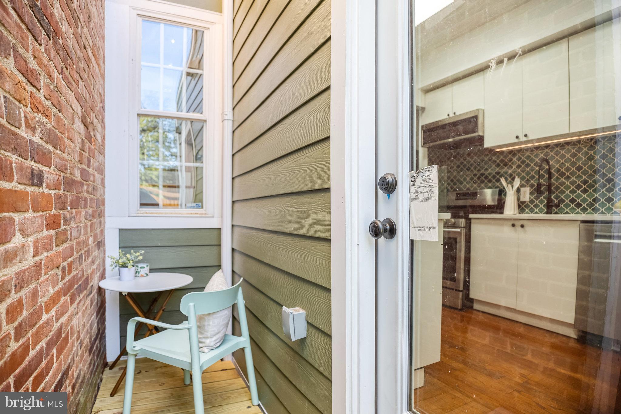1113 Holbrook Terrace Northeast Washington, DC 20002 - Photo 4 of 28 Walk out to sun-drenched nook from kitchen.