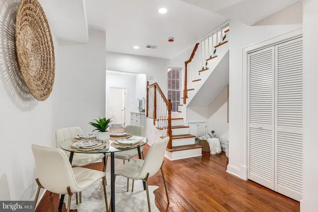 a view of a livingroom with furniture and wooden floor