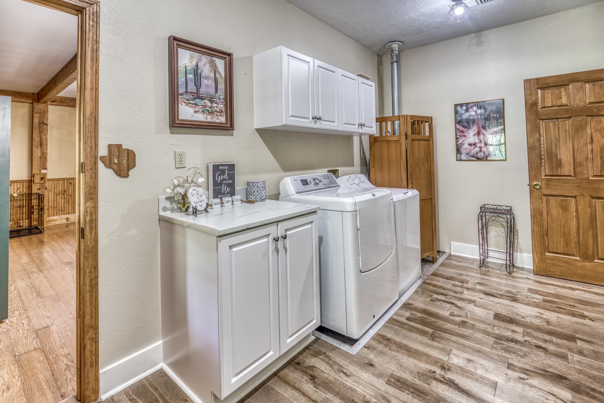 1017 Allen Road Cat Spring, TX 78933 - Photo 14 of 47 a view of kitchen with furniture and wooden floor