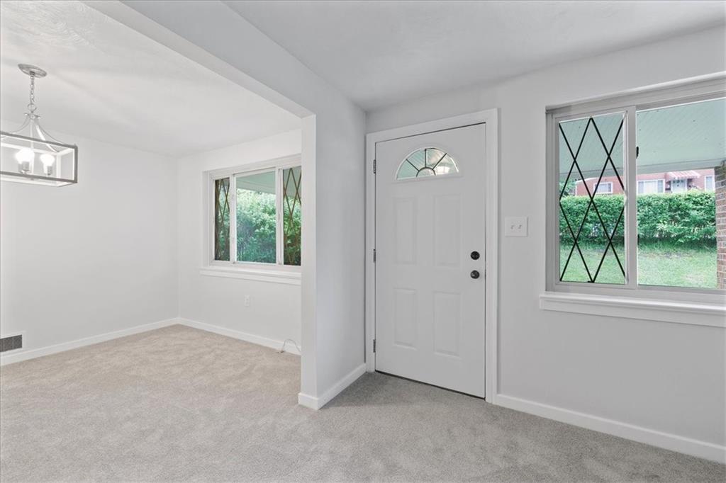 620 Beulah Road Pittsburgh, PA 15235 - Photo 5 of 25 an empty room with windows and closet