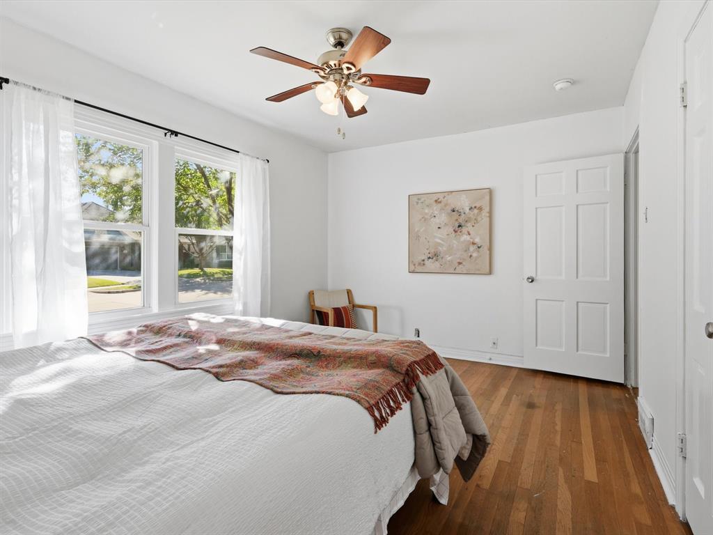 3804 Pershing Avenue Fort Worth, TX 76107 - Photo 14 of 31 a spacious bedroom with a bed and a window